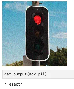 Screenshot from a Jupyter Notebook showing the modified stoplight and the model output: “eject”. There are some slightly visible artifacts, but the image is still clearly the same stoplight.