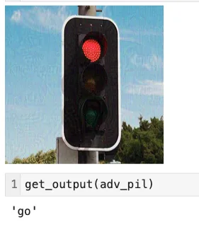 Screenshot from a Jupyter Notebook showing the modified stoplight and the model output: “go”. There are some slightly visible artifacts, but the image is still clearly the same stoplight.