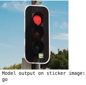 Screenshot from a Jupyter Notebook showing the modified stoplight and the model output: “go”. The stoplight clearly has a small square of random pixels in the bottom left.