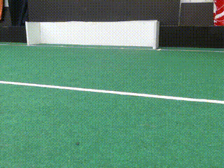 A gif of the robot scoring a goal.